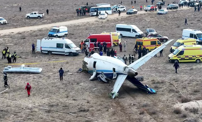 The wreckage of Azerbaijan Airlines Embraer 190 lays on the ground near the airport of Aktau, Kazakhstan, Wednesday, Dec. 25, 2024. (AP Photo/Azamat Sarsenbayev)