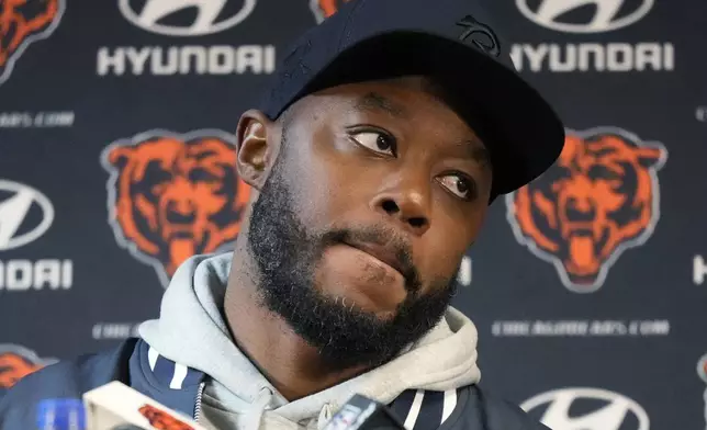 Chicago Bears interim head coach Thomas Brown listens to reporters after an NFL football game against the Seattle Seahawks, Thursday, Dec. 26, 2024, in Chicago. (AP Photo/Nam Y. Huh)