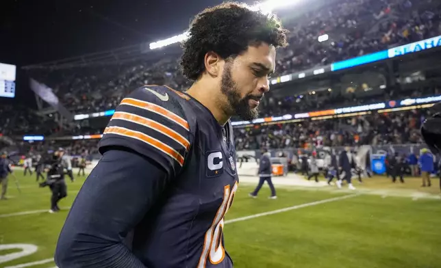 Chicago Bears quarterback Caleb Williams leaves the field following an NFL football game against the Seattle Seahawks, Thursday, Dec. 26, 2024, in Chicago. The Seahawks won 6-3. (AP Photo/Nam Y. Huh)