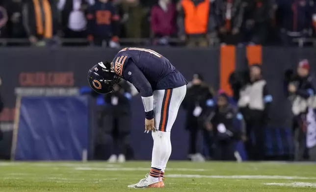 Chicago Bears quarterback Caleb Williams reacts after an incomplete pass attempt during the second half of an NFL football game against the Seattle Seahawks, Thursday, Dec. 26, 2024, in Chicago. The Seahawks won 6-3. (AP Photo/Nam Y. Huh)