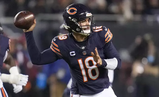 Chicago Bears quarterback Caleb Williams throws a pass against the Seattle Seahawks during the first half of an NFL football game, Thursday, Dec. 26, 2024, in Chicago. (AP Photo/Erin Hooley)