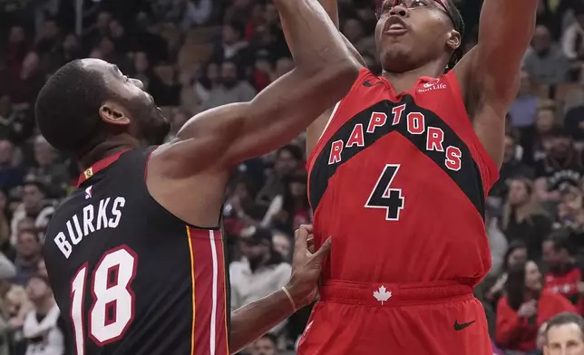 Toronto Raptors' Scottie Barnes (4) shoots against Miami Heat's Alec Burks (18) during firstwld