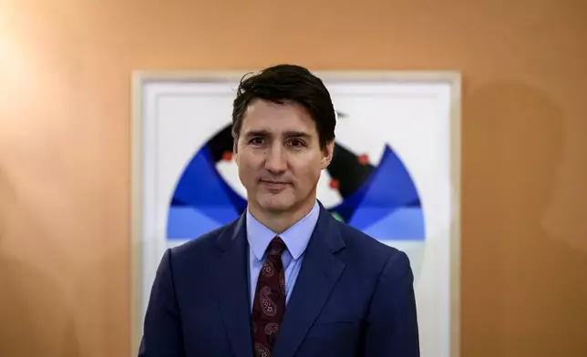 Canada's Prime Minister Justin Trudeau participates in a ceremony as Dominic LeBlanc, not shown, is sworn in as Finance Minister, at Rideau Hall in Ottawa, Ontario, Monday, Dec. 16, 2024. (Justin Tang/The Canadian Press via AP)