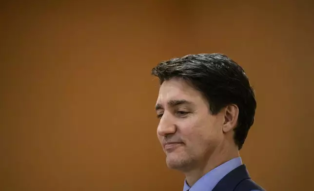 Canada's Prime Minister Justin Trudeau looks on at the start of a cabinet swearing in ceremony for Dominic LeBlanc, not shown, who will be sworn in as Finance Minister, at Rideau Hall in Ottawa, Ontario, Monday, Dec. 16, 2024. (Justin Tang/The Canadian Press via AP)