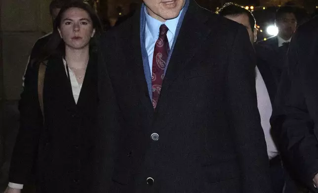 Canadian Prime Minister Justin Trudeau makes his to a national caucus meeting, in Ottawa, Ontario, Monday, Dec. 16, 2024. (Adrian Wyld/The Canadian Press via AP)