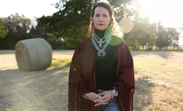 Sheri Autrey poses for a photo at her home in Cumby, Texas, Friday, Dec. 6, 2024. (AP Photo/Tony Gutierrez)