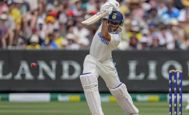 India's Yashasvi Jaiswal hits a boundary during play on the last day of the fourth cricket test between Australia and India at the Melbourne Cricket Ground, Melbourne, Australia, Monday, Dec. 30, 2024. (AP Photo/Asanka Brendon Ratnayake)