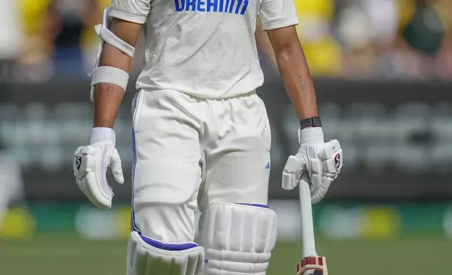 India's Yashasvi Jaiswal walks off the field after losing his wicket during play on the last day of the fourth cricket test between Australia and India at the Melbourne Cricket Ground, Melbourne, Australia, Monday, Dec. 30, 2024. (AP Photo/Asanka Brendon Ratnayake)