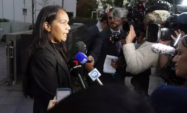 Kristal Hilaire, a daughter of Australian citizen Donna Nelson, speaks to reporters at the Chiba District Court after the verdict for Nelson in a drug smuggling case, Wednesday, Dec. 4, 2024, in Chiba, east of Tokyo. (AP Photo/Mari Yamaguchi)