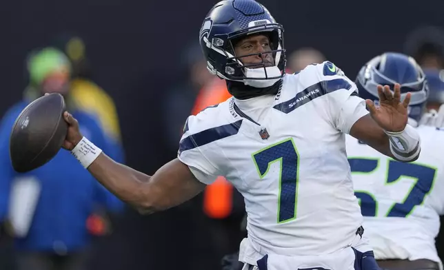 Seattle Seahawks quarterback Geno Smith (7) passes against the New York Jets during the second quarter of an NFL football game, Sunday, Dec. 1, 2024, in East Rutherford, N.J. (AP Photo/Seth Wenig)