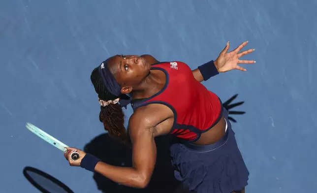 Coco Gauff of the United States serves to Donna Vekic of Croatia during their United Cup tennis match in Perth, Australia, Tuesday, Dec. 31, 2024. (AP Photo/Trevor Collens)