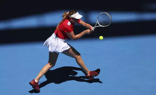 Donna Vekic of Croatia hits a return shot to Coco Gauff of the United States during their United Cup tennis match in Perth, Australia, Tuesday, Dec. 31, 2024. (AP Photo/Trevor Collens)