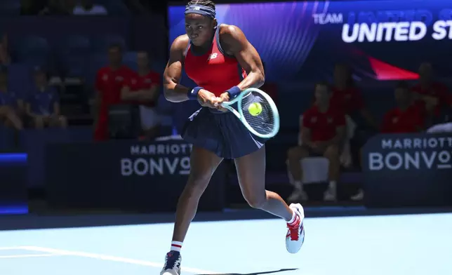 Coco Gauff of the United States hits a return shot to Donna Vekic of Croatia during their United Cup tennis match in Perth, Australia, Tuesday, Dec. 31, 2024. (AP Photo/Trevor Collens)