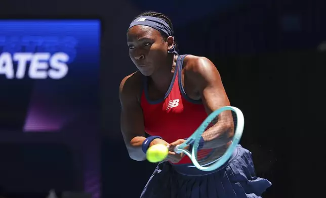 Coco Gauff of the United States hits a return shot to Donna Vekic of Croatia during their United Cup tennis match in Perth, Australia, Tuesday, Dec. 31, 2024. (AP Photo/Trevor Collens)
