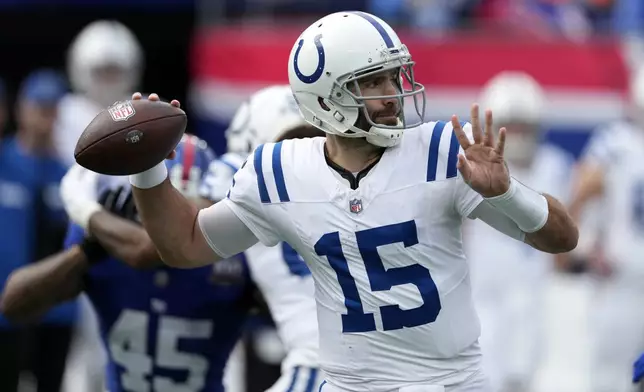 Indianapolis Colts quarterback Joe Flacco passes against the New York Giants in the first half of an NFL football game Sunday, Dec. 29, 2024, in East Rutherford, N.J. (AP Photo/Seth Wenig)