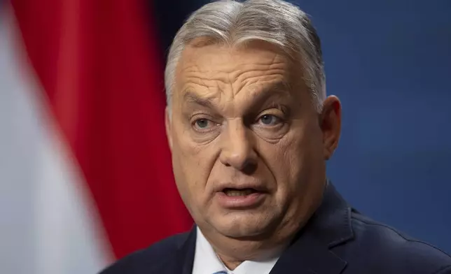 Hungarian Prime Minister Viktor Orban speaks during his annual international press conference in Budapest, Hungary, Saturday, Dec. 21, 2024. (AP Photo/Denes Erdos)