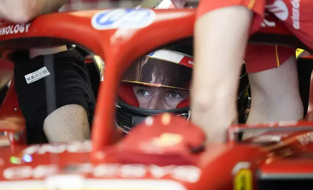 Ferrari driver Arthur Leclerc of Monaco prepares for his debut free practice ahead of the Formula One Abu Dhabi Grand Prix at the Yas Marina Circuit in Abu Dhabi, UAE, Friday, Dec. 6, 2024. (AP Photo/Darko Bandic)