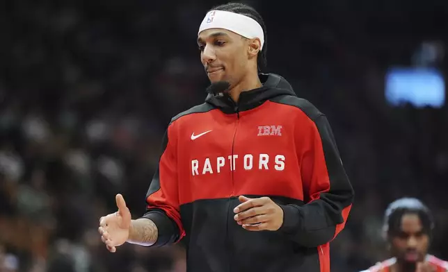 Toronto Raptors' A.J. Lawson looks on prior to NBA basketball game action against the Chicago Bulls in Toronto, Monday, Dec. 16, 2024. (Frank Gunn/The Canadian Press via AP)