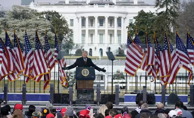 FILE - With the White House in the background, President Donald Trump speaks at a rally, Jan. 6, 2021, in Washington. (AP Photo/Jacquelyn Martin, File)