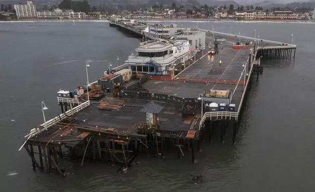 Damage to the Santa Cruz Wharf is seen in Santa Cruz, Calif., Tuesday, Dec. 24, 2024. (AP Photo/Nic Coury)