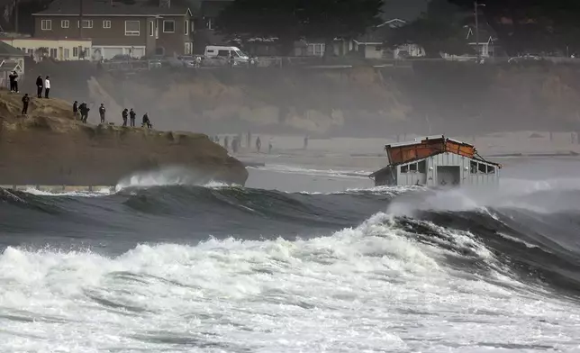 A building floats in the ocean after a wharf partially collapsed Monday, Dec. 23, 2024, in Santa Cruz, Calif. (Shmuel Thaler/The Santa Cruz Sentinel via AP)