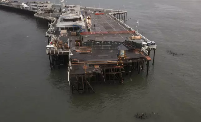 Damage to the Santa Cruz Wharf is seen in Santa Cruz, Calif., Tuesday, Dec. 24, 2024. (AP Photo/Nic Coury)