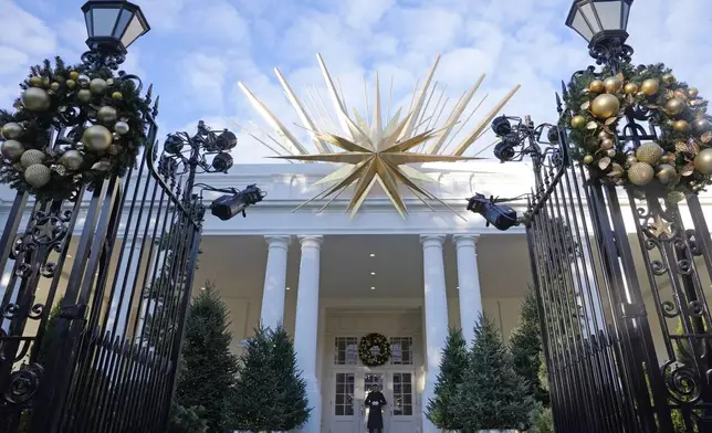 The East entrance of the White House in Washington, is decorated for the holidays, Monday, Dec. 2, 2024. (AP Photo/Susan Walsh)