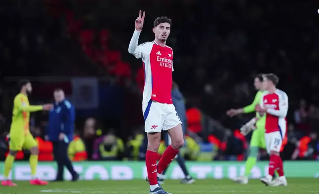 Arsenal's Kai Havertz scorer of the third goal hand gestures to spectators after the end of the Champions League opening phase soccer match between Arsenal and Monaco, at the Emirates Stadium in London, Wednesday , Dec.11, 2024. Arsenal won 3-0.(AP Photo/Dave Shopland)