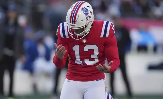 New England Patriots place-kicker Joey Slye reacts after missing a field goal-attempt during the first half of an NFL football game against the Indianapolis Colts, Sunday, Dec. 1, 2024, in Foxborough, Mass. (AP Photo/Charles Krupa)