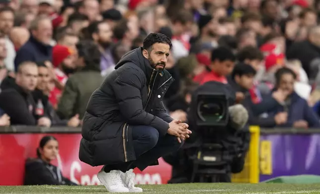 Manchester United's head coach Ruben Amorim follows the game of the English Premier League soccer match between Manchester United and Everton at the Old Trafford stadium in Manchester, England, Sunday, Dec. 1, 2024. (AP Photo/Dave Thompson)