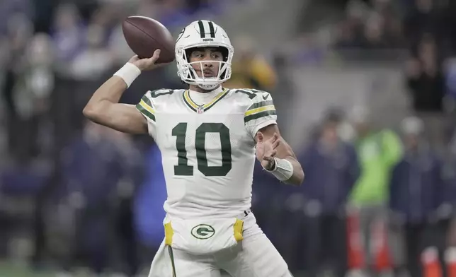 Green Bay Packers' Jordan Love throws during the second half of an NFL football game against the Seattle Seahawks Sunday, Dec. 15, 2024, in Seattle. (AP Photo/Stephen Brashear)