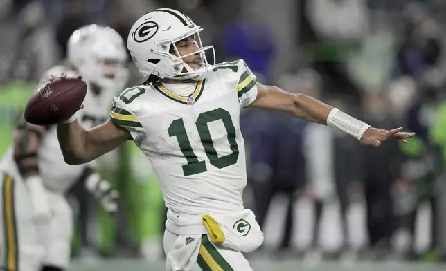 Green Bay Packers' Jordan Love throws during the second half of an NFL football game against the Seattle Seahawks Sunday, Dec. 15, 2024, in Seattle. (AP Photo/Stephen Brashear)