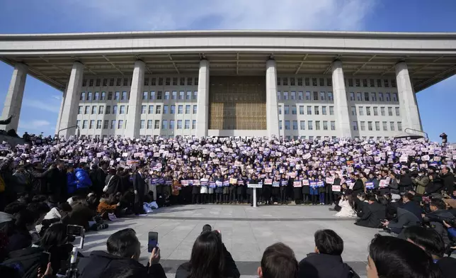 Members of main opposition Democratic Party stage a rally against South Korean President Yoon Suk Yeol at the National Assembly in Seoul, South Korea, Wednesday, Dec. 4, 2024. (AP Photo/Ahn Young-joon)