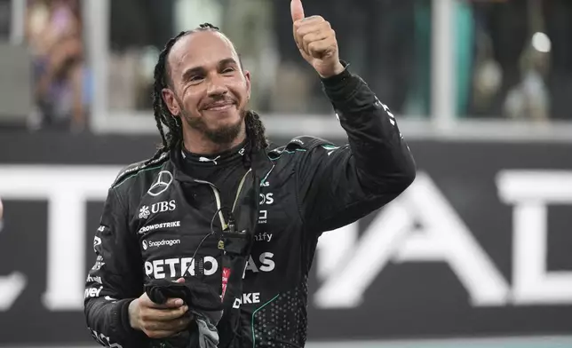Mercedes driver Lewis Hamilton of Britain reacts after the Formula One Abu Dhabi Grand Prix at the Yas Marina Circuit in Abu Dhabi, UAE, Sunday, Dec. 8, 2024. (AP Photo/Darko Bandic)
