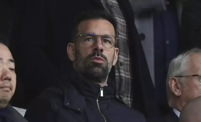 Ruud van Nistelrooy sits in the stands during the Premier League match at the Gtech Community Stadium, Brentford on Saturday Nov. 30, 2024. (Steven Paston/PA via AP)