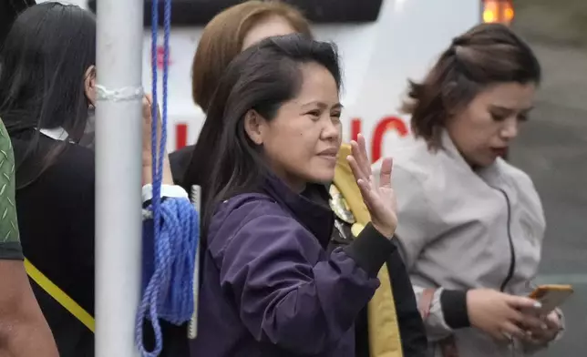 Mary Jane Veloso, a Filipino woman who spent almost 15 years in an Indonesian prison for drug trafficking and was nearly executed by firing squad in 2015, arrives at the Correctional Institution for Women in Mandaluyong, Philippines, Wednesday, Dec. 18, 2024. (AP Photo/Aaron Favila)