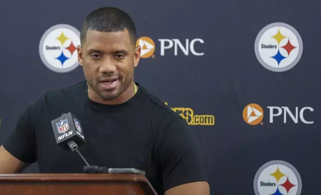 Pittsburgh Steelers quarterback Russell Wilson talks to reporters following an NFL football game against the Baltimore Ravens, Saturday, Dec. 21, 2024, in Baltimore. The Ravens won 34-17. (AP Photo/Stephanie Scarbrough)