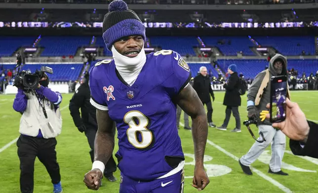 Baltimore Ravens quarterback Lamar Jackson leaves the field following an NFL football game against the Pittsburgh Steelers, Saturday, Dec. 21, 2024, in Baltimore. The Ravens won 34-17. (AP Photo/Nick Wass)