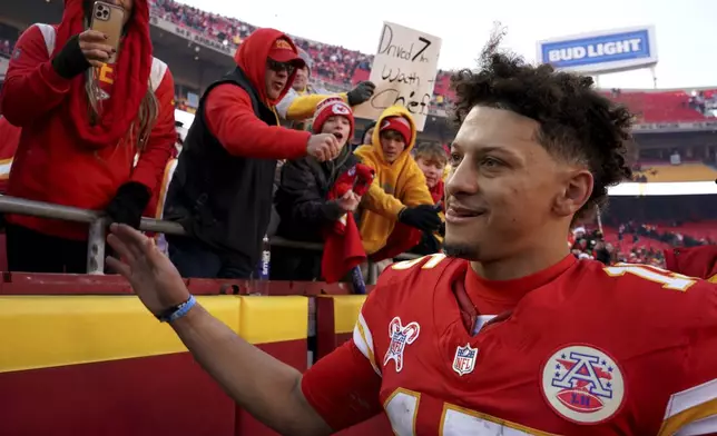 Kansas City Chiefs quarterback Patrick Mahomes heads off the field following an NFL football game against the Houston Texans Saturday, Dec. 21, 2024, in Kansas City, Mo. The Chiefs won 27-19. (AP Photo/Ed Zurga)