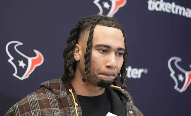 Houston Texans quarterback C.J. Stroud speaks during a news conference following an NFL football game against the Kansas City Chiefs Saturday, Dec. 21, 2024, in Kansas City, Mo. The Chiefs won 27-19. (AP Photo/Ed Zurga)