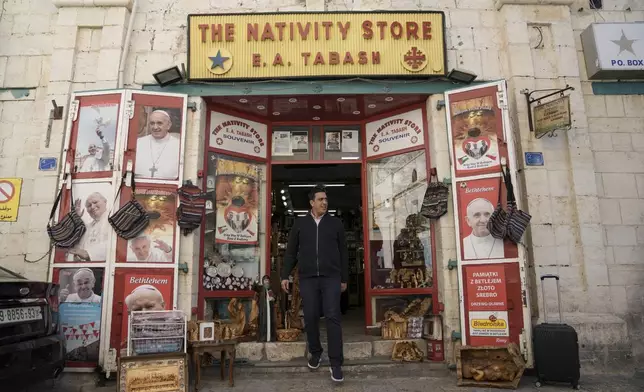 A shop near Church of the Nativity, where Christians believe Jesus Christ was born, seen ahead of Christmas in the West Bank city of Bethlehem, Tuesday, Dec. 17, 2024. (AP Photo/Mahmoud Illean)