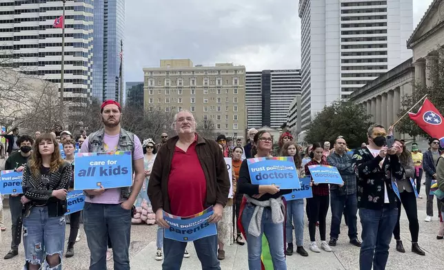 FILE - Advocates gather for a rally at the state Capitol complex in Nashville, Tenn., to oppose a series of bills that target the LGBTQ community, Feb. 14, 2023. (AP Photo/Jonathan Mattise, File)