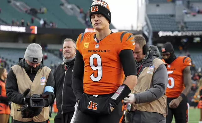 Cincinnati Bengals quarterback Joe Burrow (9) walks off the field after his team's loss to the Pittsburgh Steelers in an NFL football game Sunday, Dec. 1, 2024, in Cincinnati. (AP Photo/Jeff Dean)