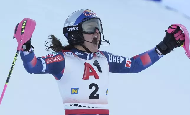 Croatia's Zrinka Ljutic celebrates winning an alpine ski, women's World Cup slalom race in Semmering, Austria, Sunday, Dec. 29, 2024. (AP Photo/Giovanni Auletta)