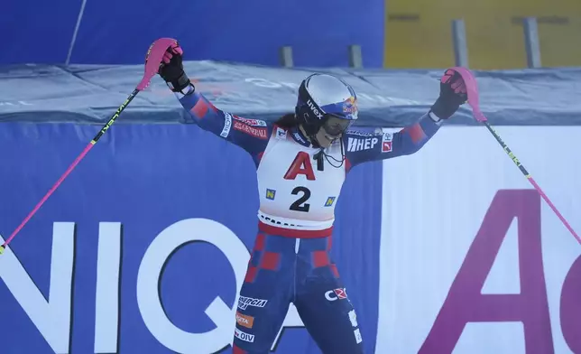 Croatia's Zrinka Ljutic celebrates winning an alpine ski, women's World Cup slalom race in Semmering, Austria, Sunday, Dec. 29, 2024. (AP Photo/Giovanni Auletta)