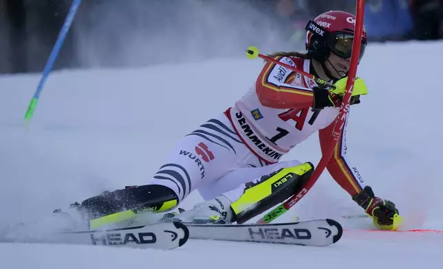 Germany's Lena Duerr speeds down the course during an alpine ski, women's World Cup slalom race, in Semmering, Austria, Sunday, Dec. 29, 2024. (AP Photo/Piermarco Tacca)