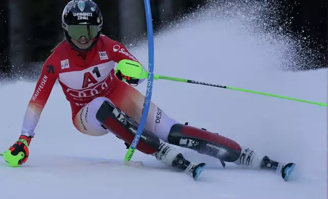 Switzerland's Camille Rast speeds down the course during an alpine ski, women's World Cup slalom race, in Semmering, Austria, Sunday, Dec. 29, 2024. (AP Photo/Piermarco Tacca)