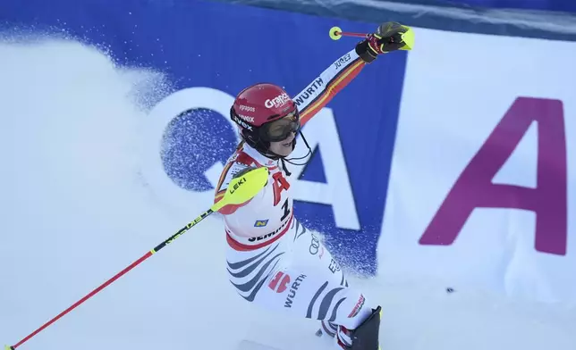 Germany's Lena Duerr reacts after completing an alpine ski, women's World Cup slalom race in Semmering, Austria, Sunday, Dec. 29, 2024. (AP Photo/Giovanni Auletta)