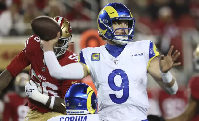 Los Angeles Rams quarterback Matthew Stafford (9) passes against the San Francisco 49ers during the first half of an NFL football game in Santa Clara, Calif., Thursday, Dec. 12, 2024. (AP Photo/Jed Jacobsohn)
