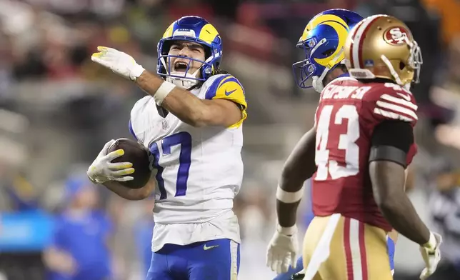 Los Angeles Rams wide receiver Puka Nacua (17) reacts after catching a pass against the San Francisco 49ers during the second half of an NFL football game in Santa Clara, Calif., Thursday, Dec. 12, 2024. (AP Photo/Godofredo A. Vásquez)